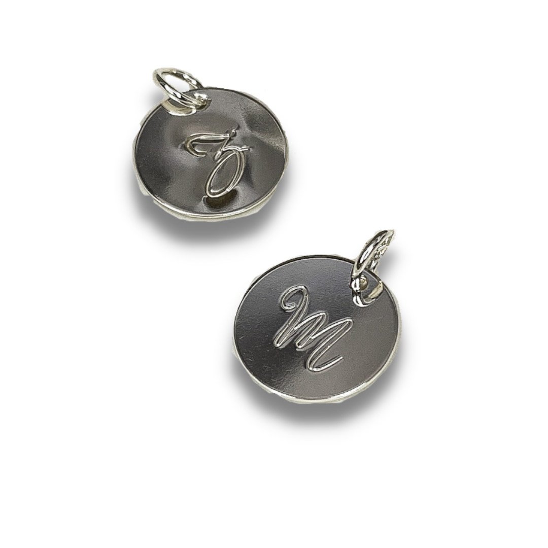 Sterling silver 5/5" round disks that can be hand stamped with initials, dates or symbols