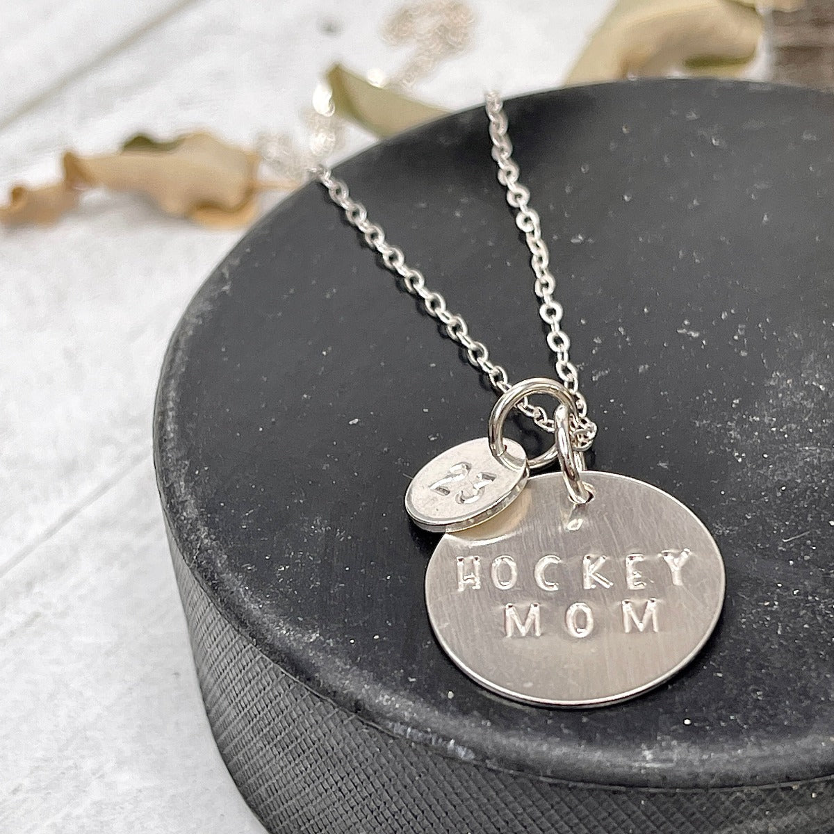 Hockey Mom necklace stamped with your kids jersey number in sterling silver