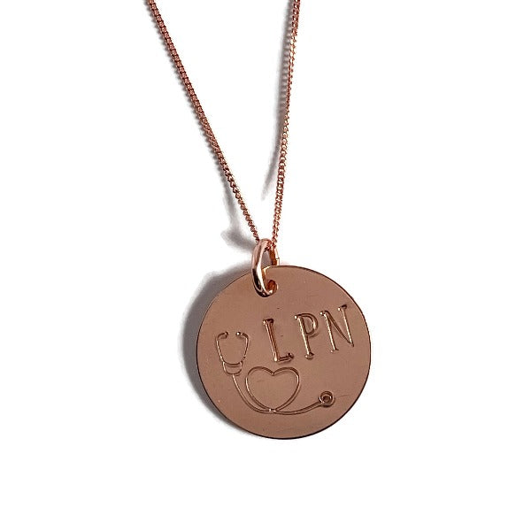 Rose Gold stethoscope necklace with LPN designation stamped on it