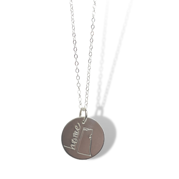 Saskatchewan hand stamped with home on a disk necklace