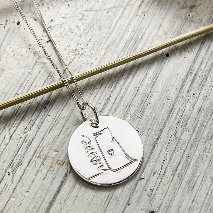 Sterling silver hand-stamped Saskatchewan necklaces with HOME